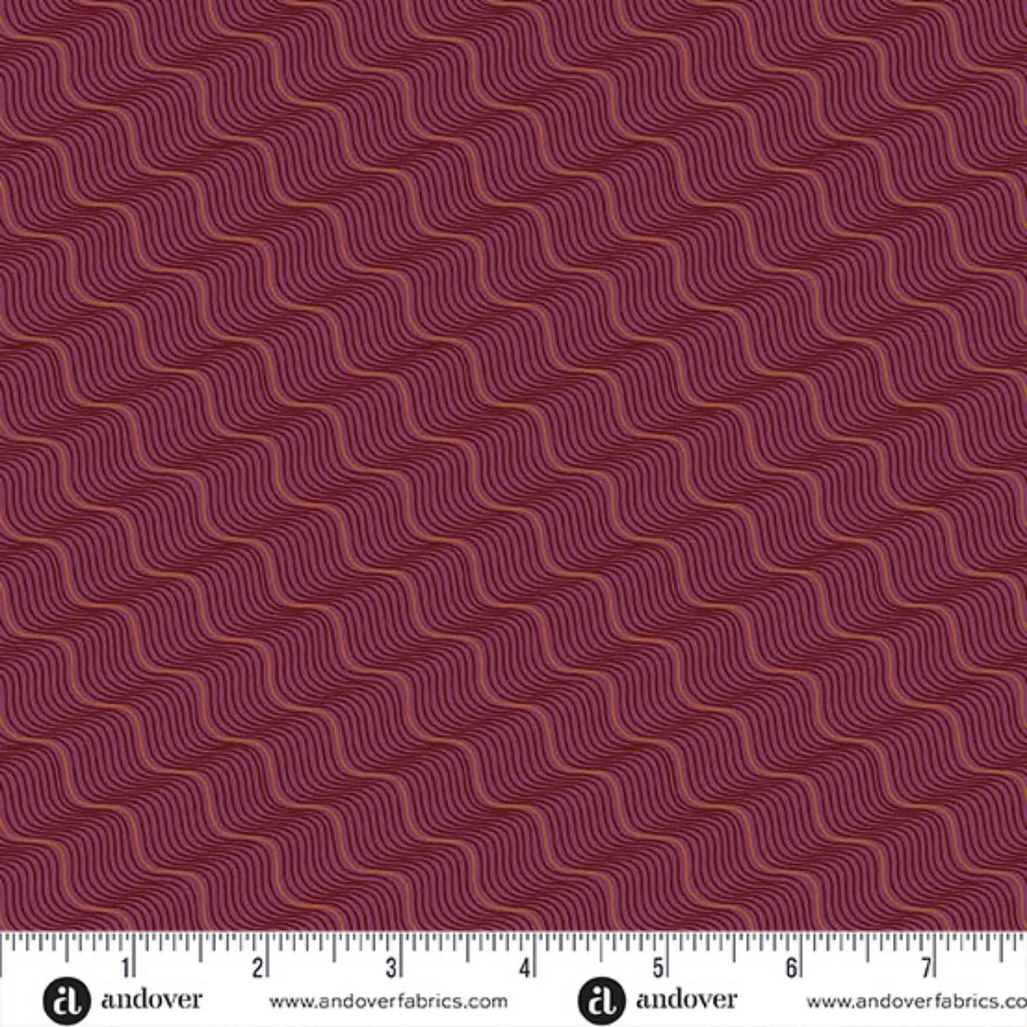 A repeating pattern of wavy diagonal lines in rose gold and black on a rich burgundy-red background. Ruler at the bottom for scale.