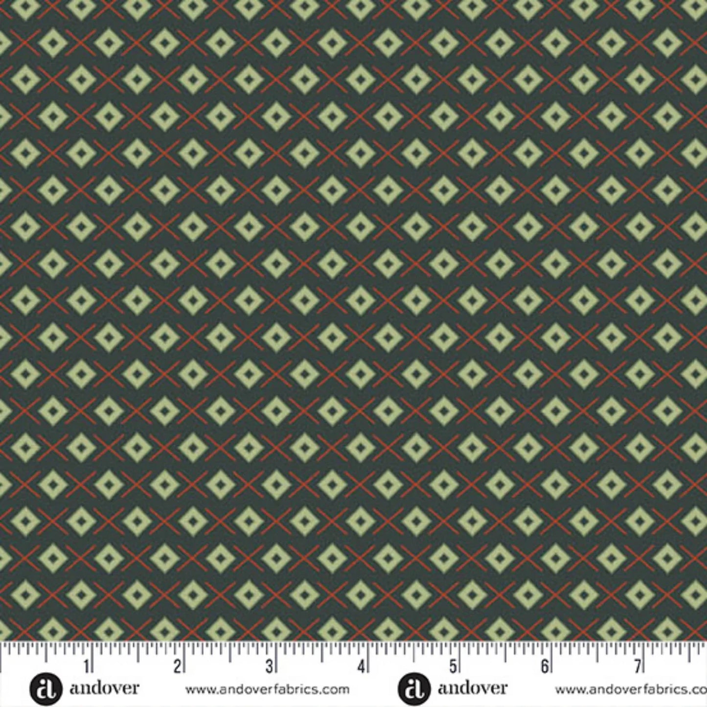 A repeating geometric pattern featuring light sage green diamonds on a dark forest-green background, accented by thin red crosses. Ruler at the bottom for scale.