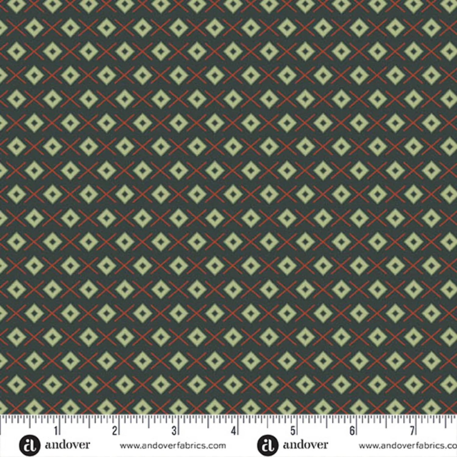 A repeating geometric pattern featuring light sage green diamonds on a dark forest-green background, accented by thin red crosses. Ruler at the bottom for scale.