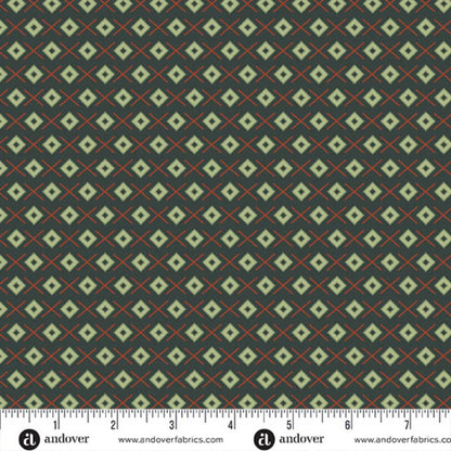 A repeating geometric pattern featuring light sage green diamonds on a dark forest-green background, accented by thin red crosses. Ruler at the bottom for scale.