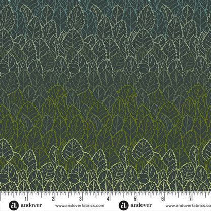 A densely packed, layered leaf pattern, shading from dark evergreen into a warm, golden chartreuse on a deep forest-green background. Ruler at the bottom for scale.