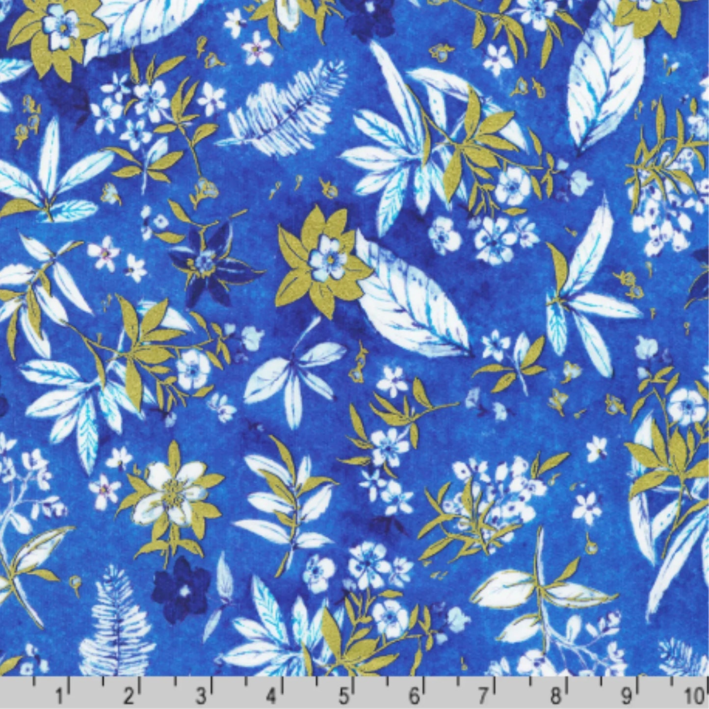 Floral pattern with blue, gold, and white flowers on a blue background with a ruler for scale