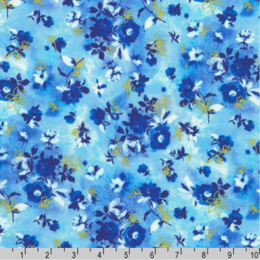 Blue and white flowers accented with gold on a blue background with a ruler for scale