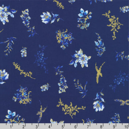 Floral pattern with blue and gold flowers on a dark blue background with a ruler for scale