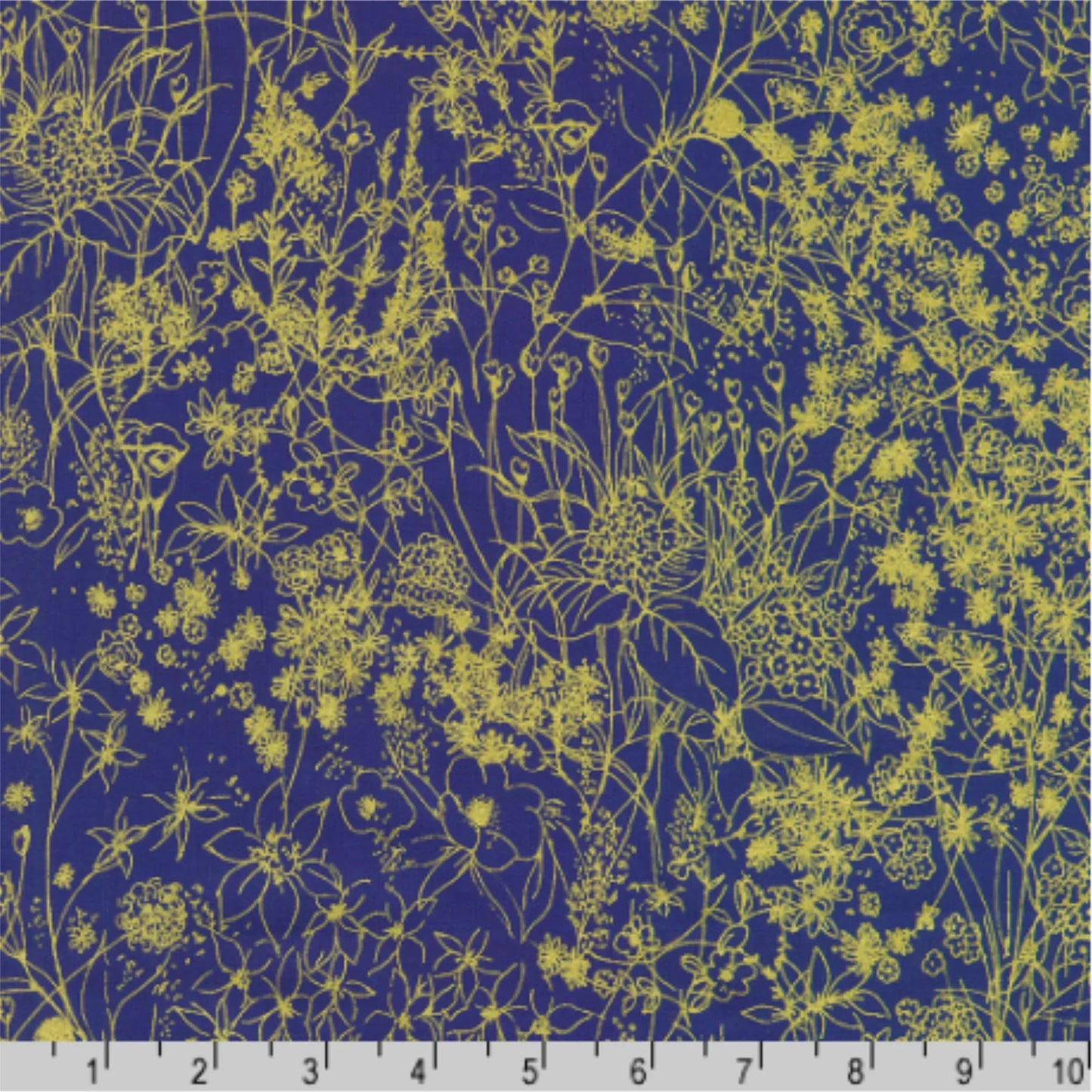 Floral pattern with gold flowers on a navy blue background with a ruler for scale