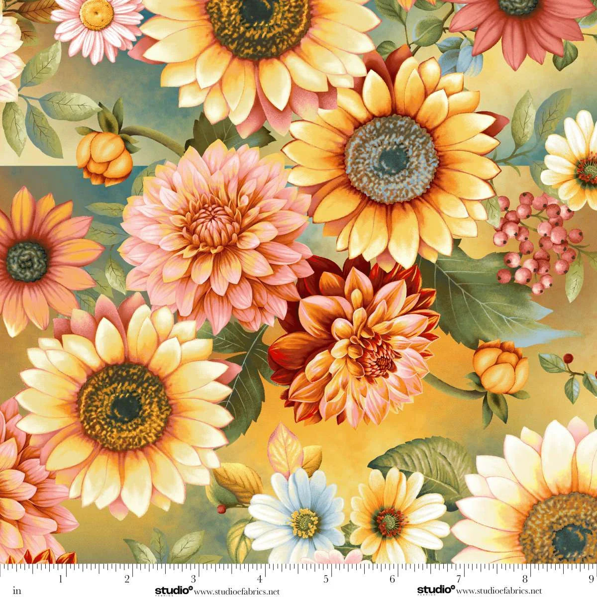 Colorful floral pattern of sunflowers and dahlias on a blended blue and yellow background. Ruler at the bottom for scale.