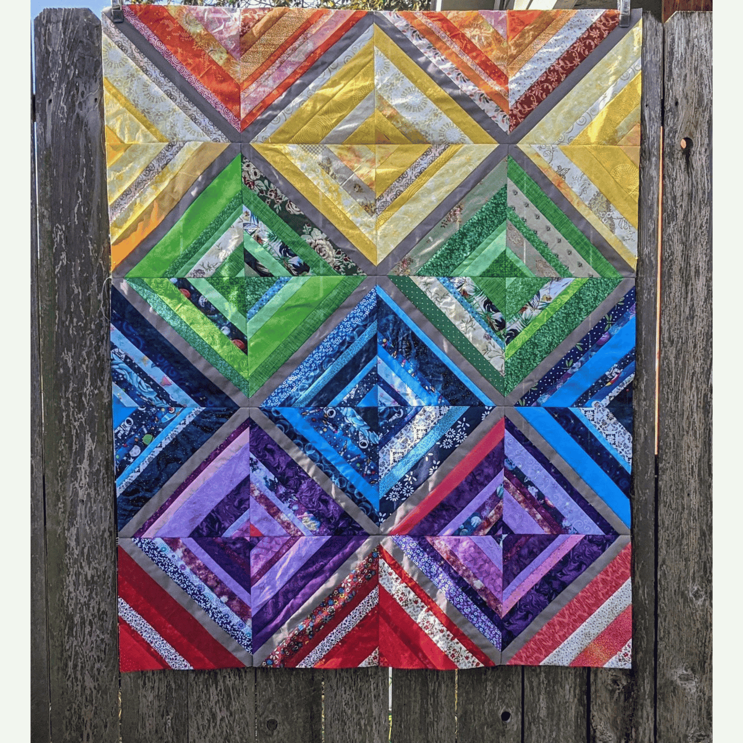 The Biased Quilt Pattern makes a fun strip quilt that is a great stash-buster! Sew various sized strips together to make scrappy blocks that look like they were sewn on-point. 