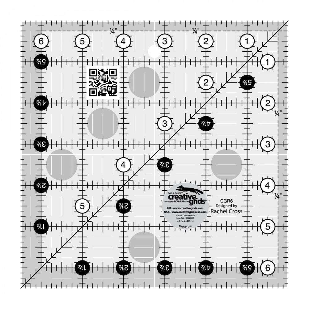 This Creative Grids 6 1/2" Square Quilt Ruler features easy-to-read black and white markings printed in 1" grids marked in 1/8" and 1/4" increments.