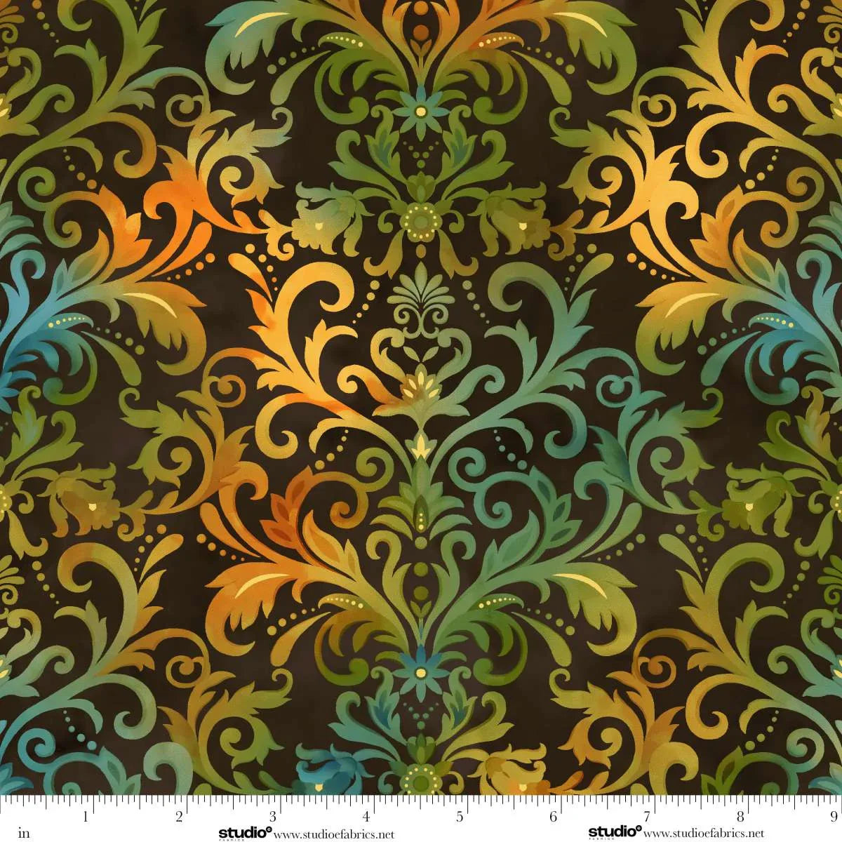 Decorative pattern with swirls and floral elements in green, orange, and blue on a dark brown background. Ruler at the bottom for scale.