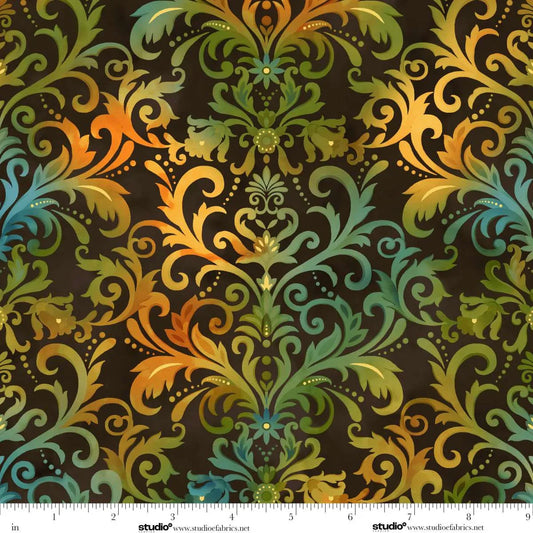 Decorative pattern with swirls and floral elements in green, orange, and blue on a dark brown background. Ruler at the bottom for scale.