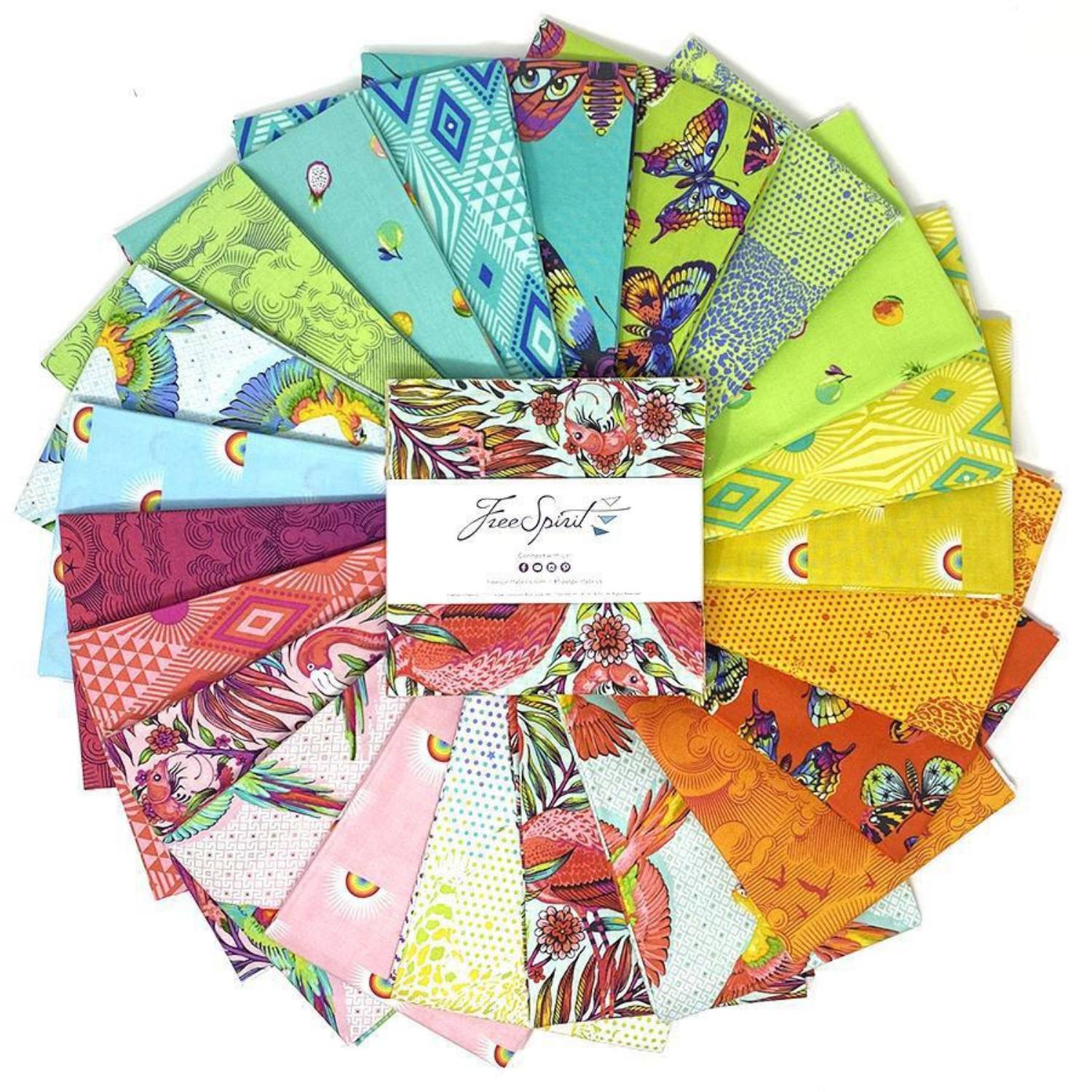 Collection of colorful fabric squares arranged in a circle with a charm pack in the center