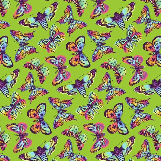 Pattern of colorful butterflies on a green background