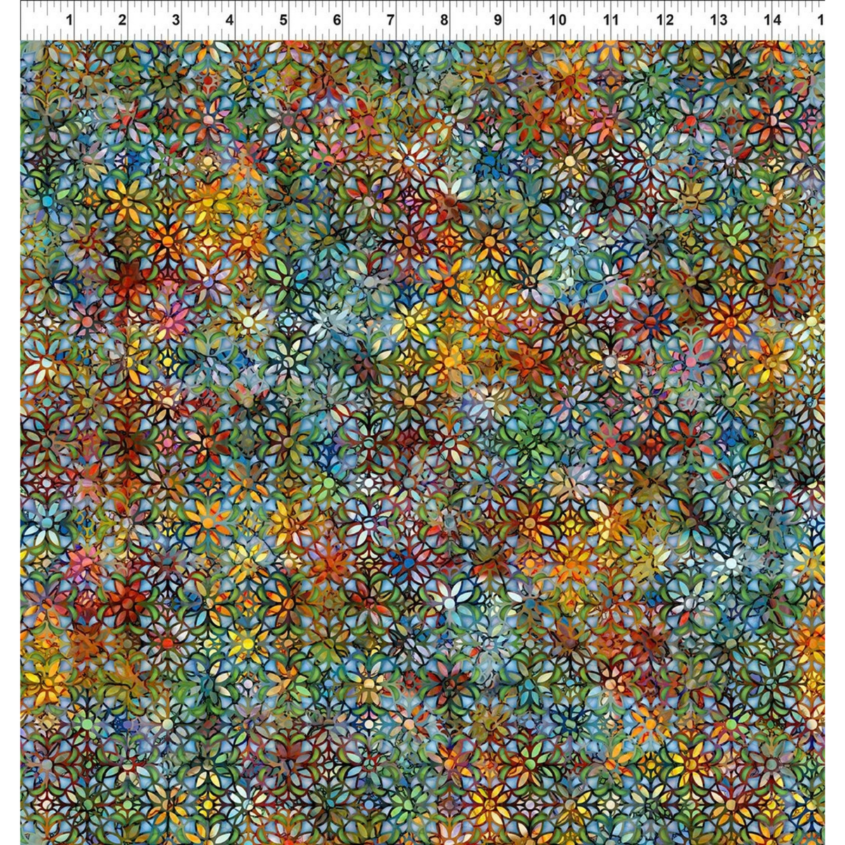 A close-up of a multicolor floral fabric pattern with small daisy-like flowers in blue, green, yellow, orange, red, and teal, shown with a white ruler at the top edge for scale.