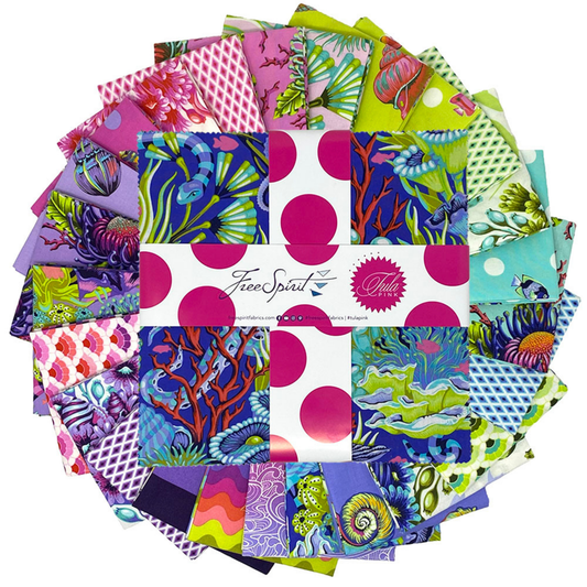 A fanned-out bundle of colorful fabric squares in vivid purples, greens, pinks, and blues, featuring aquatic and floral designs with a Layer Cake in the center.