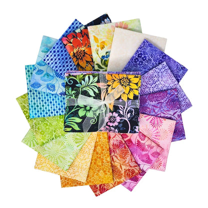 Circular arrangement of colorful fabric swatches featuring vibrant floral designs with a bundle tied with a white ribbon in the center.