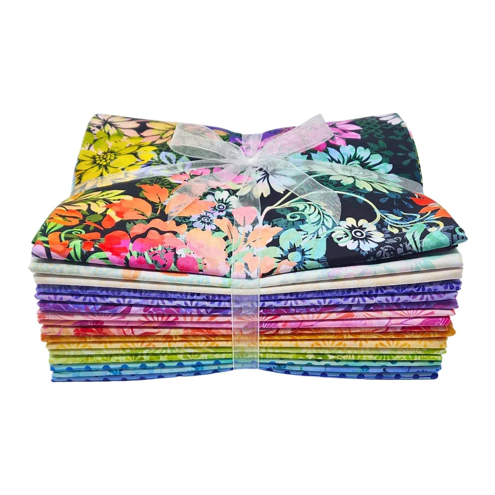 A stack of colorful fabric swatches featuring vibrant floral designs tied with a white ribbon.
