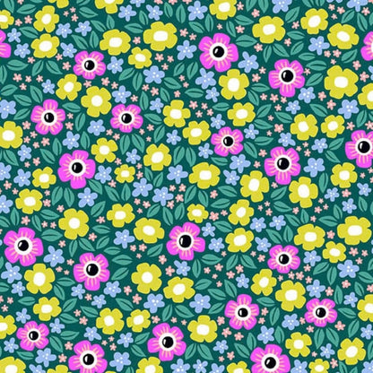 Colorful floral pattern with black and white eyeballs in the centers of pink, green, and blue flowers on a teal background.