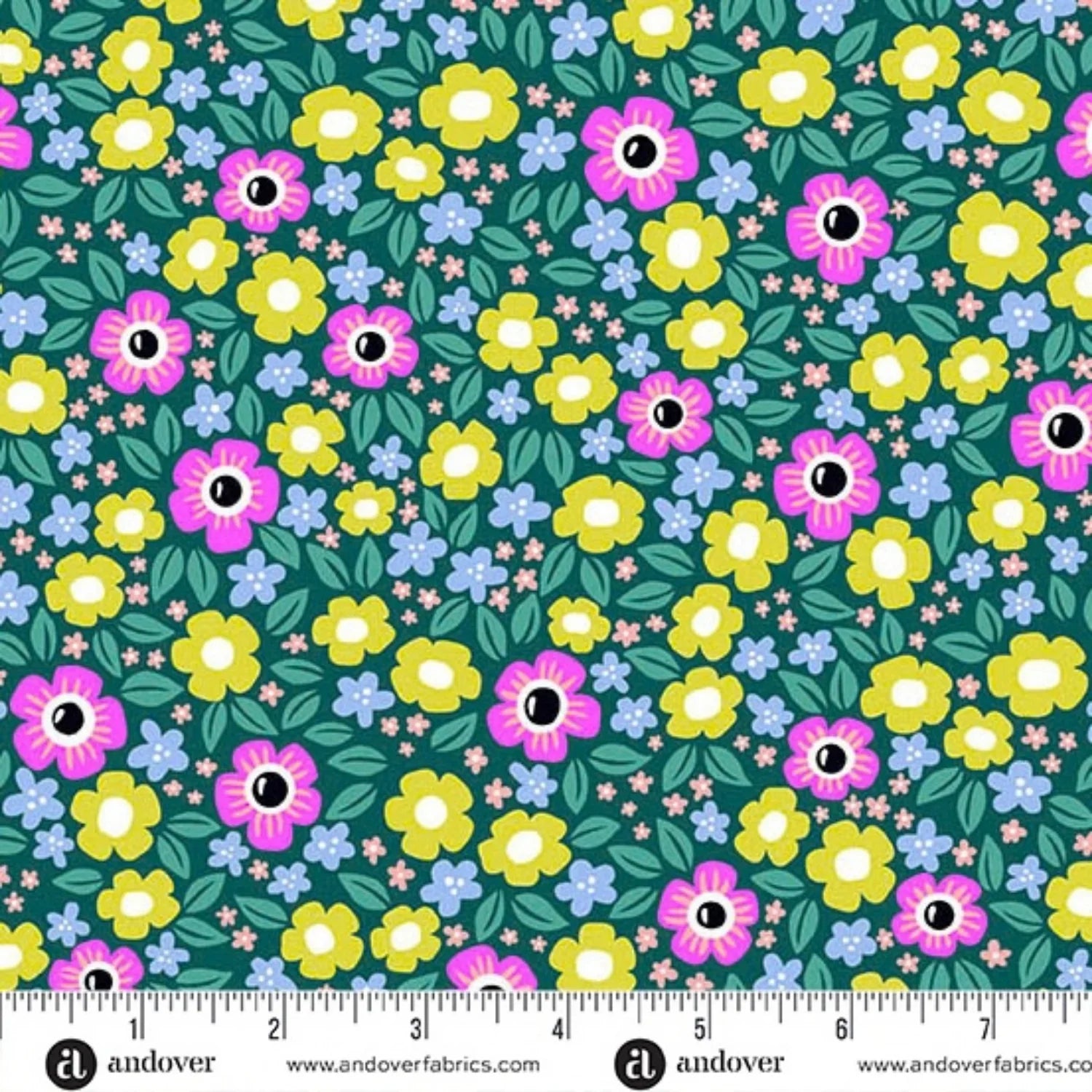 Colorful floral pattern with black and white eyeballs in the centers of pink, green, and blue flowers on a teal background. Ruler at the bottom for scale.