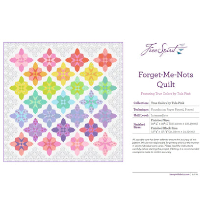 Colorful quilt pattern with 'Forget-Me-Nots' design on a white background, featuring the FreeSpirit brand.