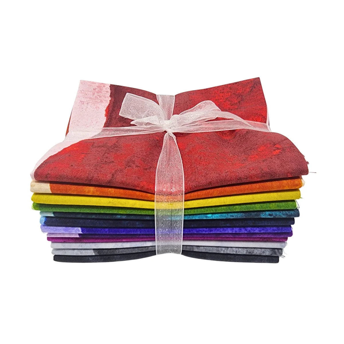 A stack of colorful fabric squares tied together with a sheer white ribbon, shown on a plain white background.