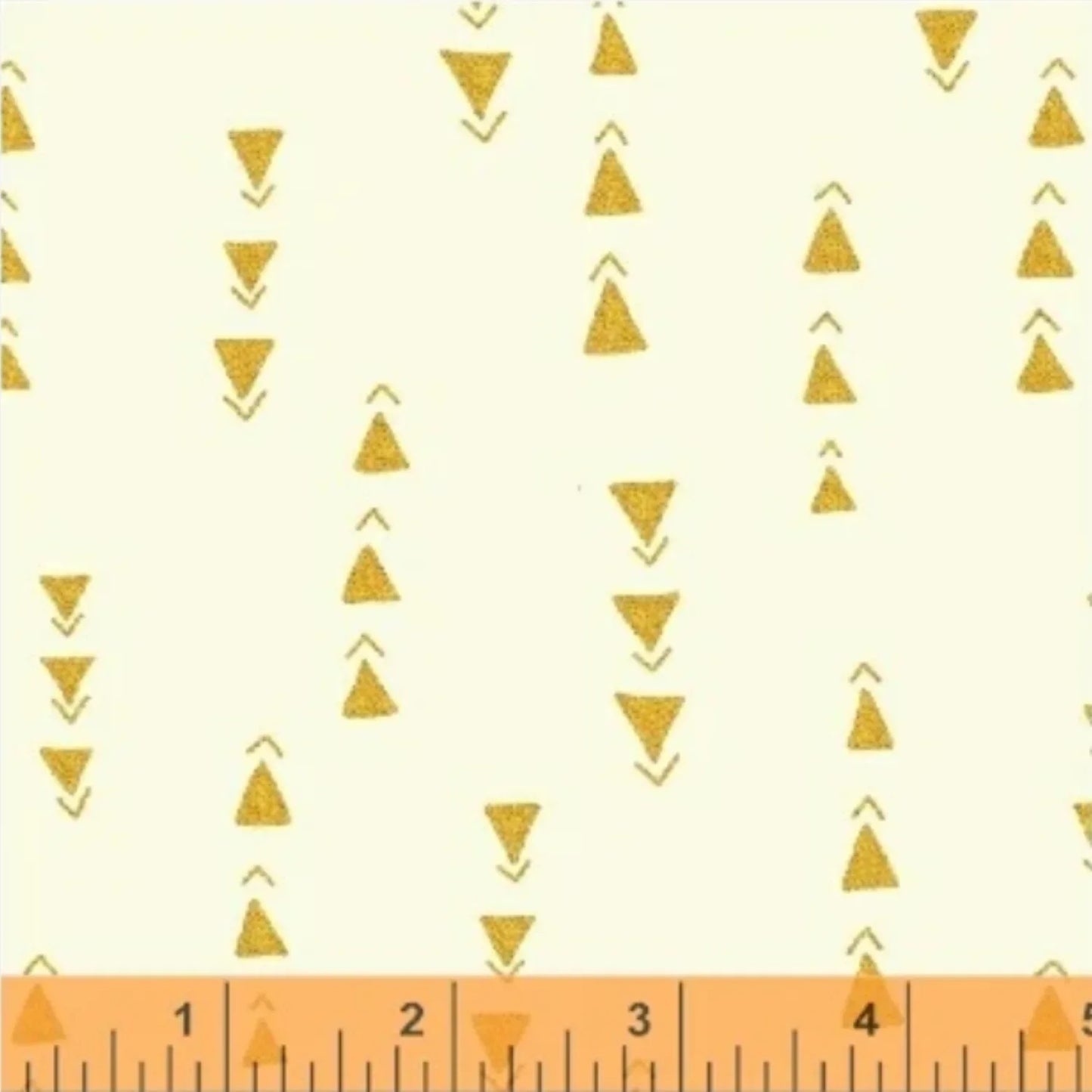 Pattern of gold triangles on a white background with a ruler at the bottom.