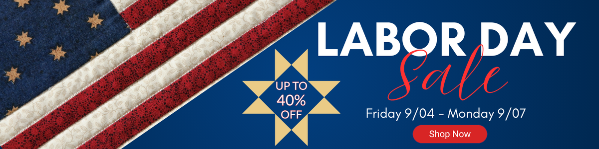 Labor Day sale promotional banner with a diagonal American flag pattern on the left, large white and red text reading 'LABOR DAY Sale' on a dark blue background, a gold starburst offering up to 40% off, and a red 'Shop Now' button.