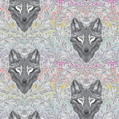 Pattern of wolf heads with colorful foliage on a grey background