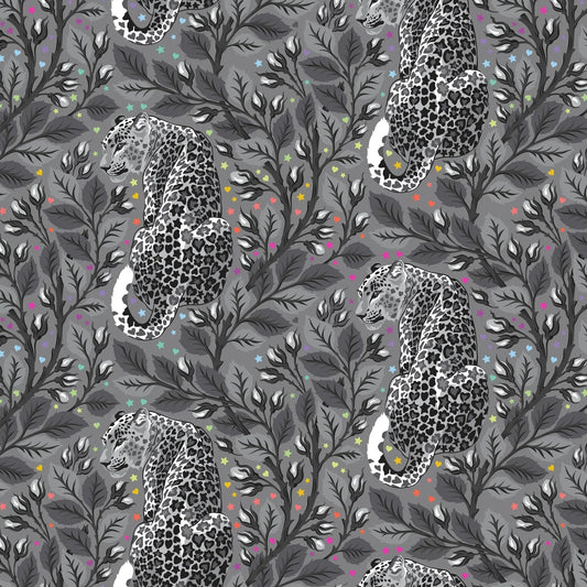 Pattern of leopards and leaves on a gray background dotted with rainbow accents