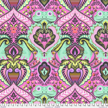 A vibrant hot pink fabric pattern featuring mint green frogs nestled into an ornate pink, purple, and olive green damask floral design. Ruler at the bottom for scale.