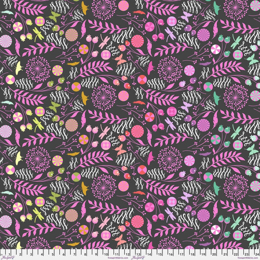 A seamless botanical pattern featuring stylized flowers, leaves, butterflies, feathers, and pinwheels in pink, purple, orange, yellow, and white on a dark charcoal black background. Ruler at the bottom for scale.