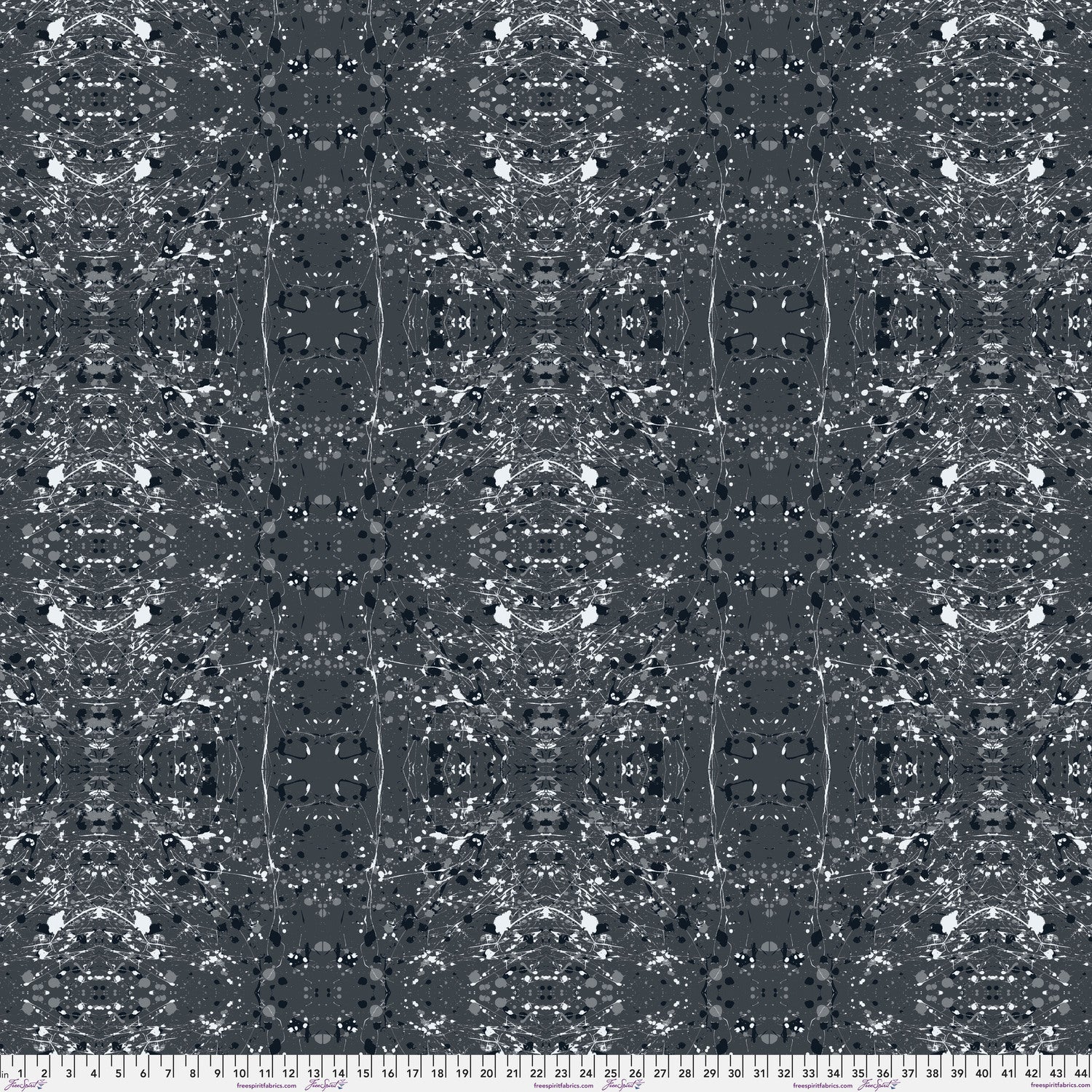 A seamless abstract fabric pattern featuring symmetrical, kaleidoscopic motifs in black, grey, and white, with a ruler at the bottom for scale.