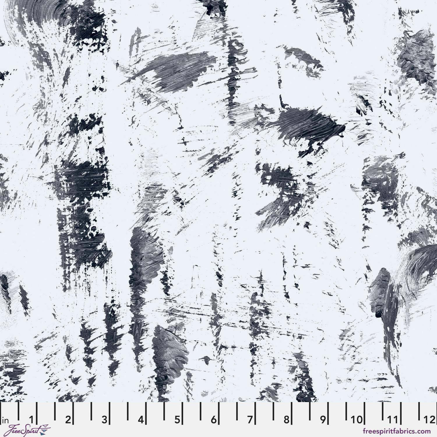 Fabric pattern featuring abstract black and white brushstrokes with a ruler at the bottom for scale.