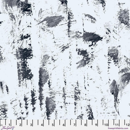 Fabric pattern featuring abstract black and white brushstrokes with a ruler at the bottom for scale.