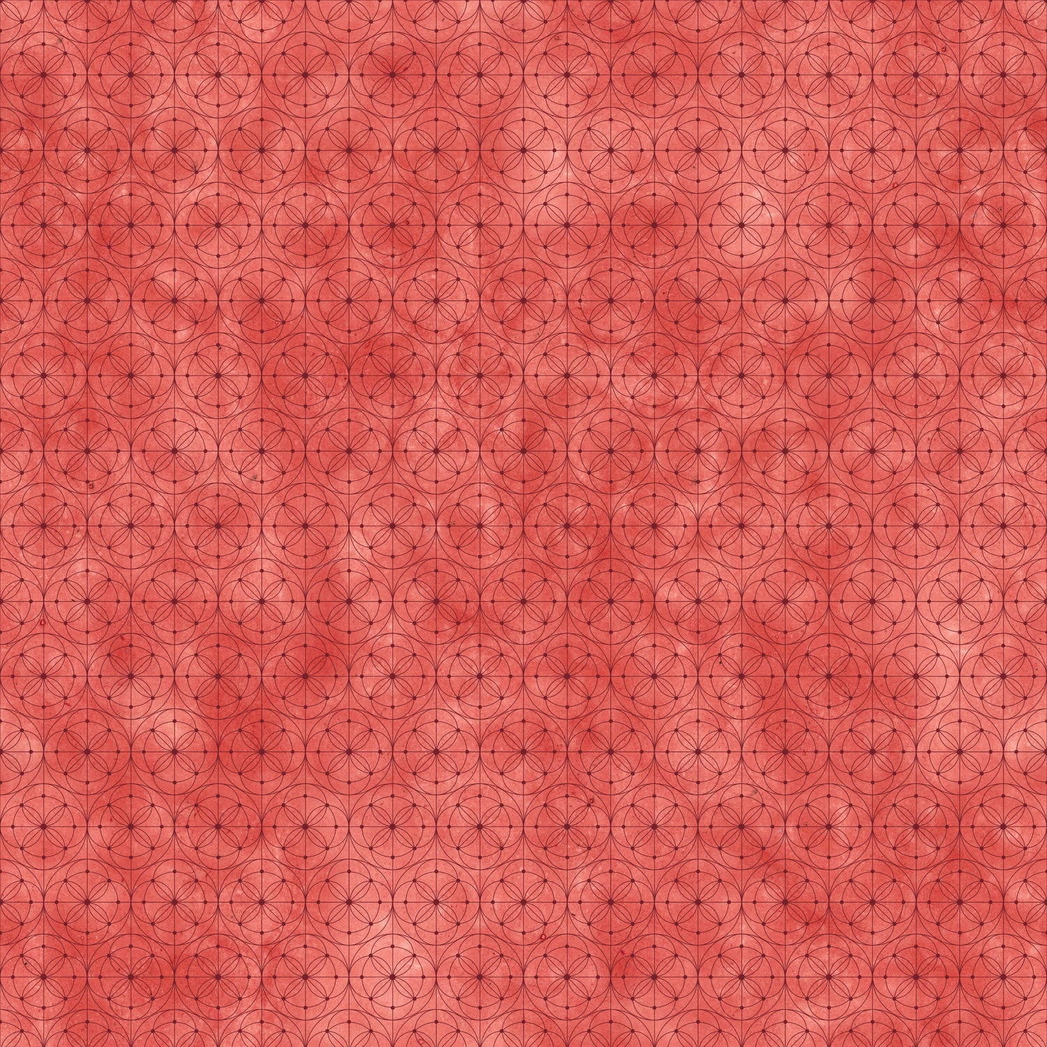 Fabric with a delicate allover geometric pattern of interlocking circles and starburst motifs on a tomato-red background