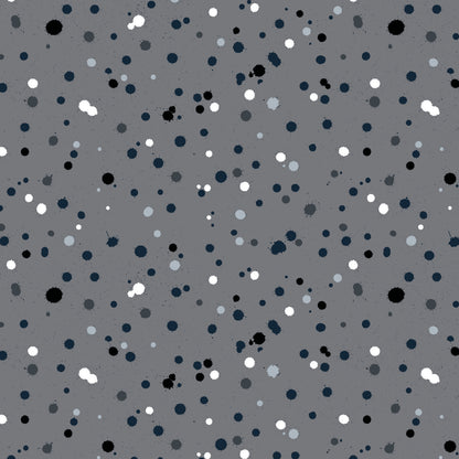 Fabric design with paint drops in black, white, and slate-grey tones scattered across a medium grey background. 