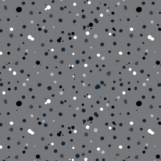 Fabric design with paint drops in black, white, and slate-grey tones scattered across a medium grey background. 