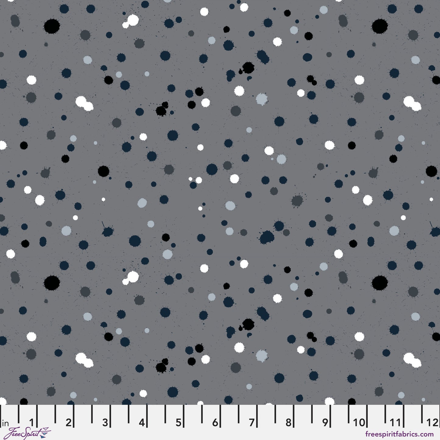 Fabric design with paint drops in black, white, and slate-grey tones scattered across a medium grey background. Ruler at the bottom for scale.