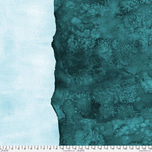 Abstract fabric pattern with a watercolor-like texture featuring dark teal and light, turquoise blue. Ruler at the bottom for scale.
