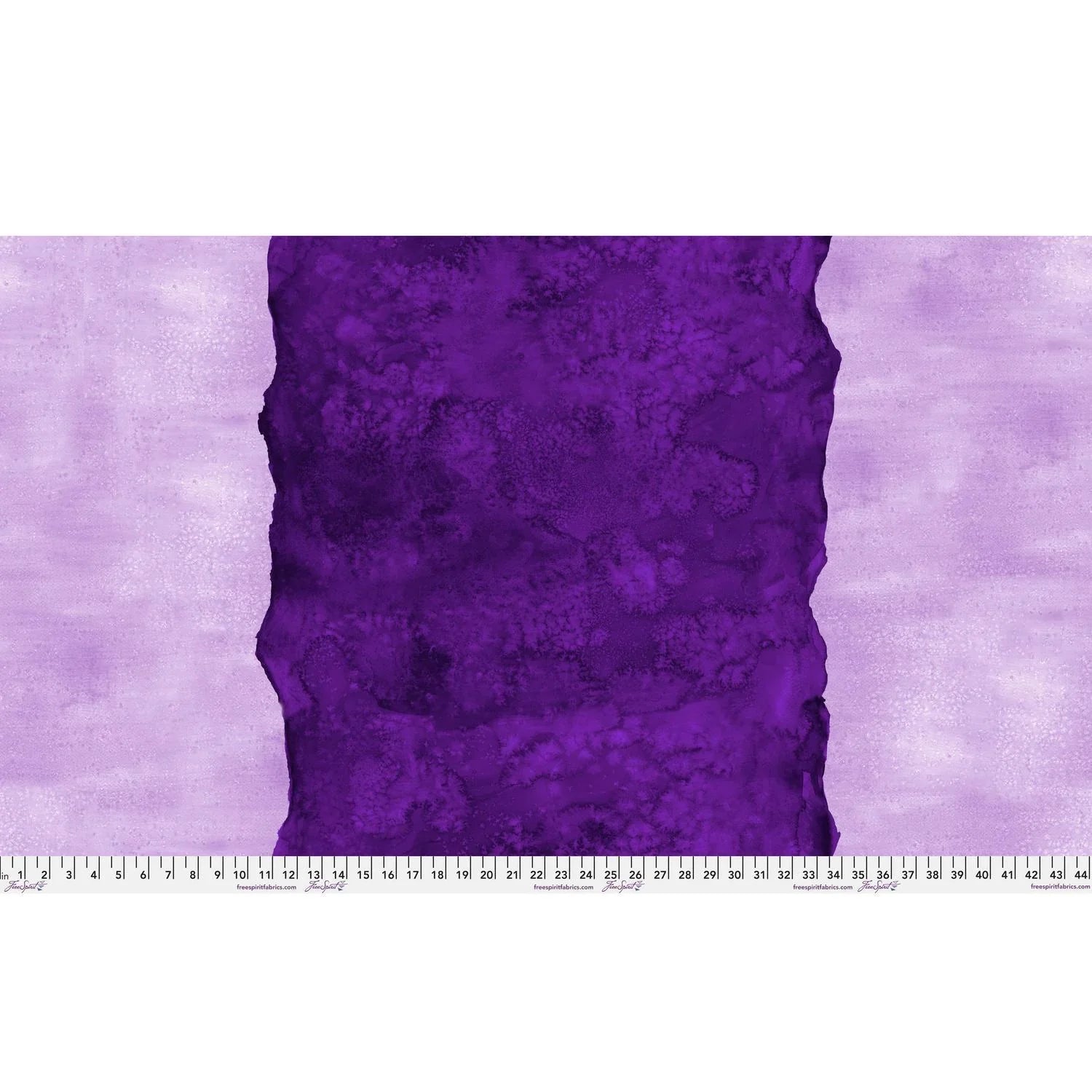 Abstract fabric pattern with a watercolor-like texture featuring a central stripe of dark violet and outer light, lavender purple edges. Ruler at the bottom for scale.