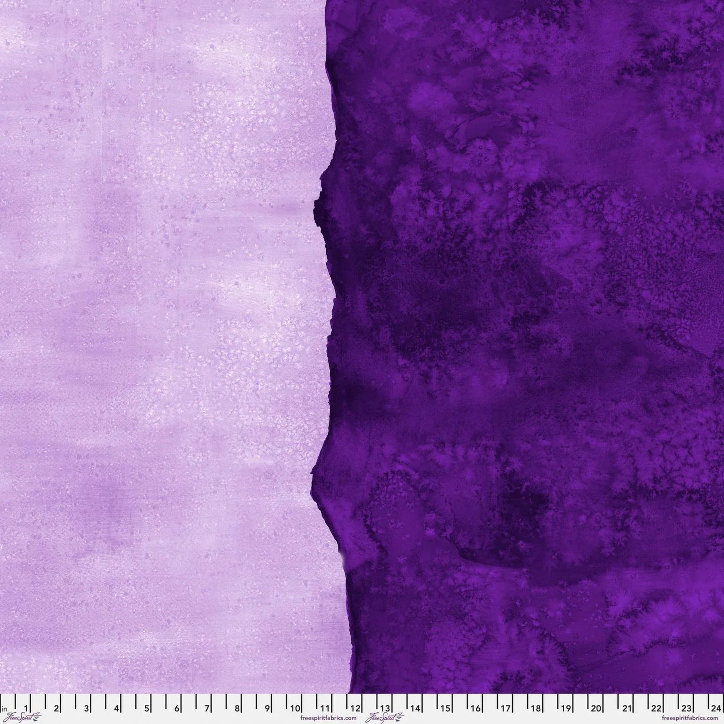 Abstract fabric pattern with a watercolor-like texture featuring dark violet and light, lavender purple. Ruler at the bottom for scale.