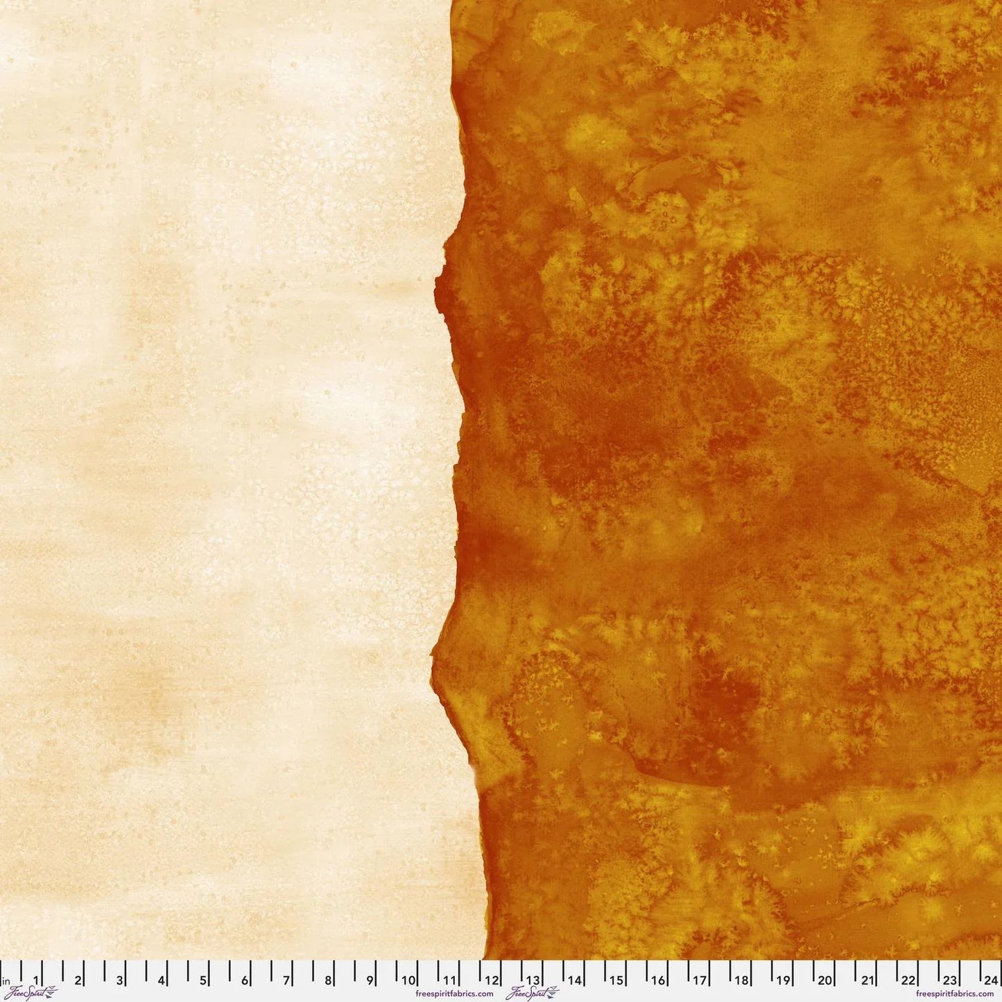 Abstract fabric pattern with a watercolor-like texture featuring burnt orange and light, peachy cream. Ruler at the bottom for scale.