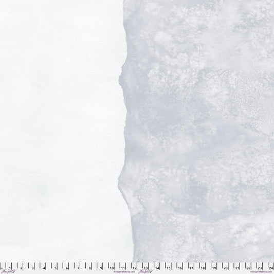 Abstract fabric pattern with a watercolor-like texture featuring silver-grey and clean, icy-white. Ruler at the bottom for scale.