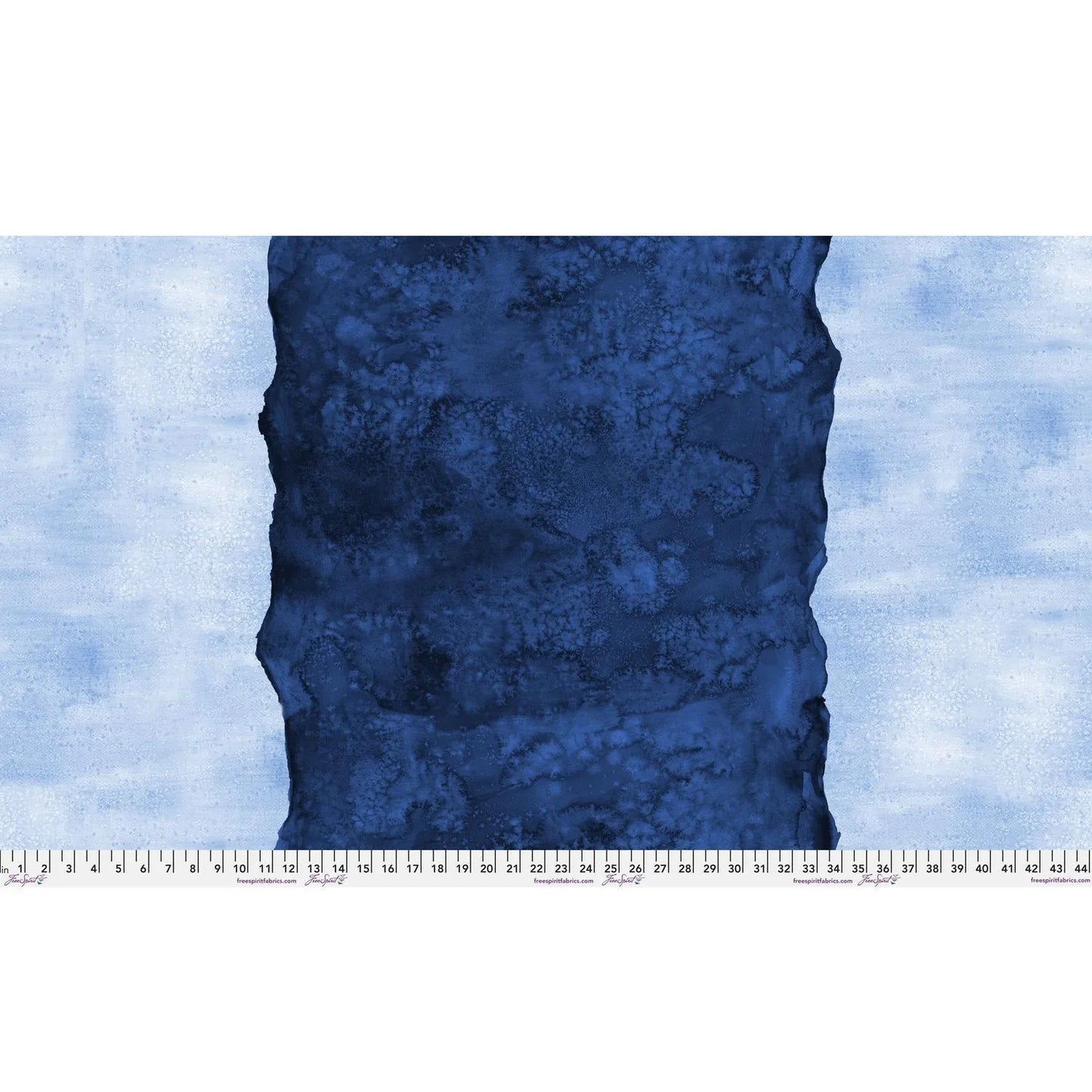 Abstract fabric pattern with a watercolor-like texture featuring a central stripe of dark navy and outer light, powder blue edges. Ruler at the bottom for scale.