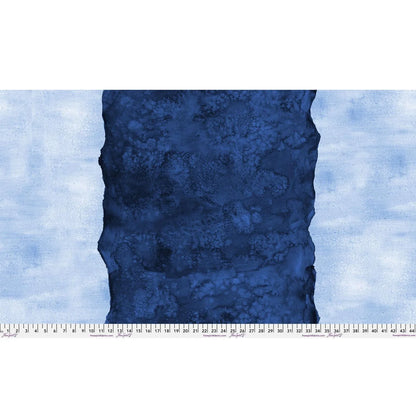 Abstract fabric pattern with a watercolor-like texture featuring a central stripe of dark navy and outer light, powder blue edges. Ruler at the bottom for scale.