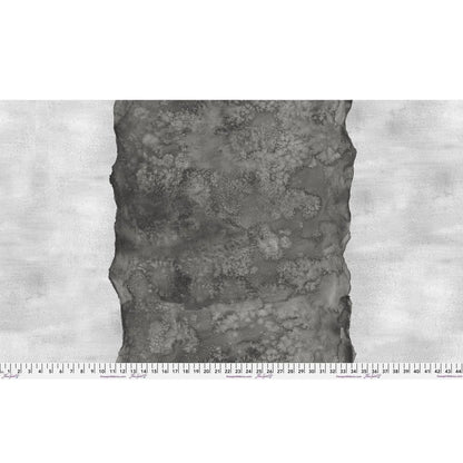 Abstract fabric pattern with a watercolor-like texture featuring a central stripe of dark charcoal and outer light, silver-grey edges. Ruler at the bottom for scale.