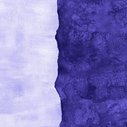 Abstract fabric pattern with a watercolor-like texture featuring dark indigo and light, lilac purple.