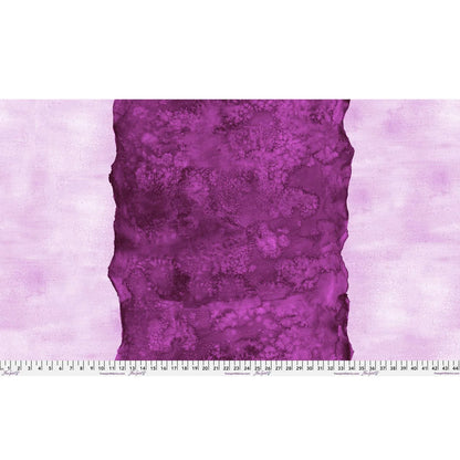 Abstract fabric pattern with a watercolor-like texture featuring a central stripe of dark magenta and outer light, raspberry pink edges. Ruler at the bottom for scale.