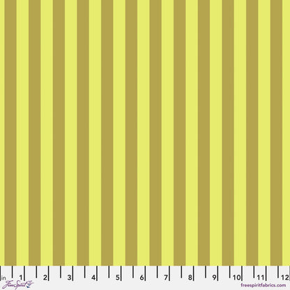 Neon Tent Stripe in Moon Beam features alternating yellow and gold stripes that run parallel to the selvage. 12 inch ruler at the bottom for scale