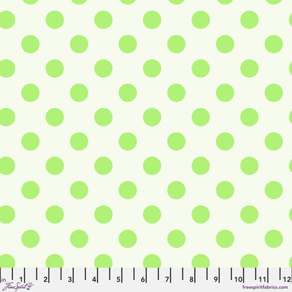 Neon Pom Poms in Karma features large lime green dots on a light dusty green background. 12 inch ruler at the bottom for scale