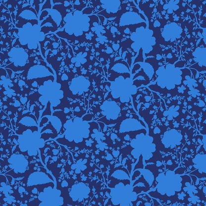 True Colors Wildflower in Anemone features bold blue silhouettes of tangled blooming vines contrasted against a dark blue background. This modern floral print highlights interesting color combinations, kickstarts quilts, and brings every project to life.